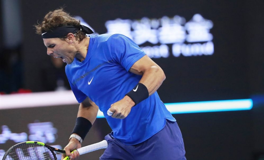Nadal salva dos bolas de partido ante Pouille y supera la primera ronda