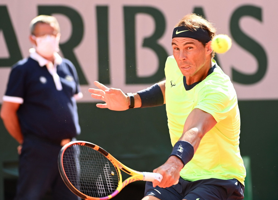 Nadal, sólido y a cuartos